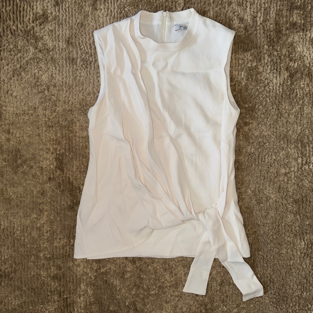 White sleeveless blouse with side-tie